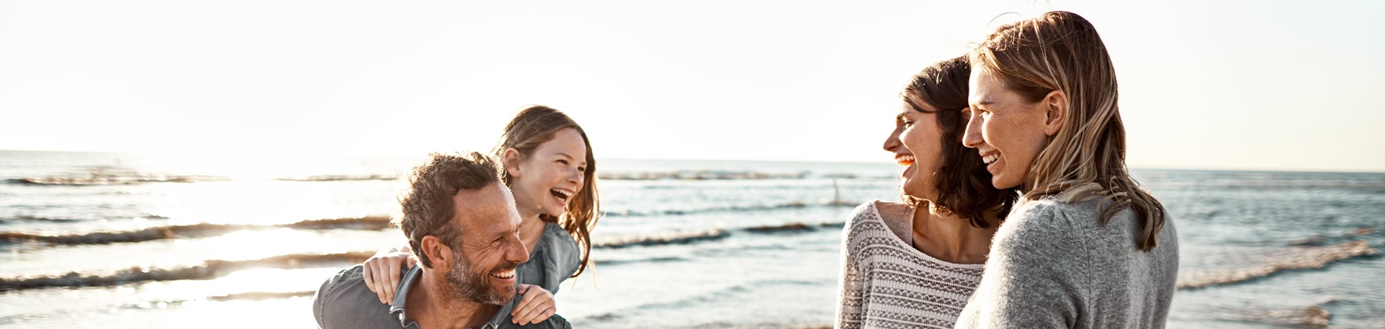 Family having fun at the beach