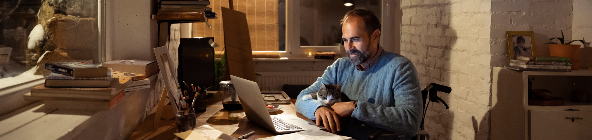 Man researching on a laptop