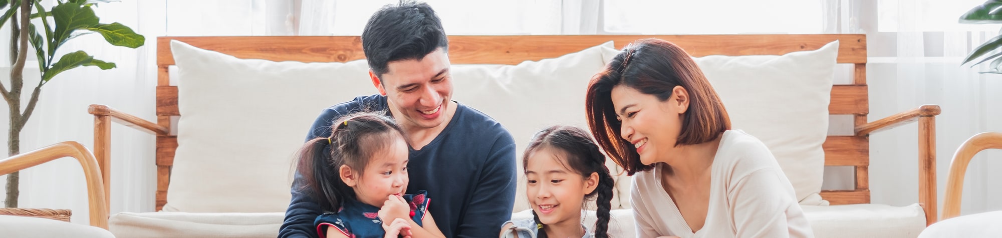 Family playing in living room