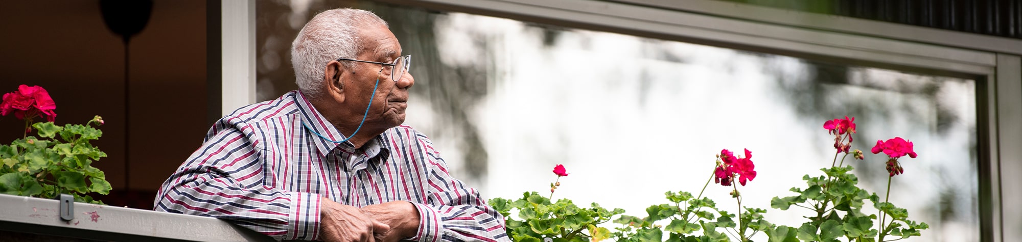 Older man on balcony