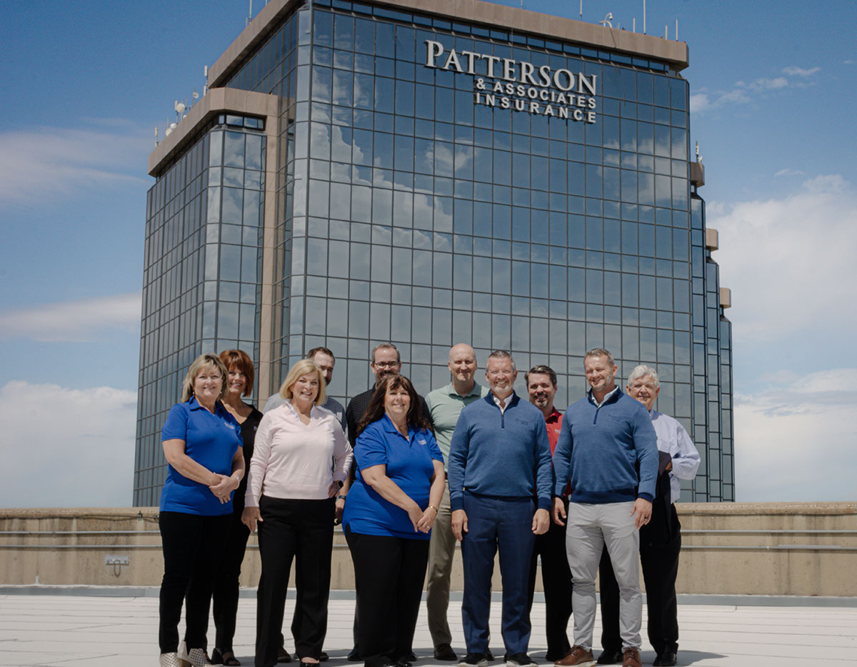 Patterson Insurance team on roof