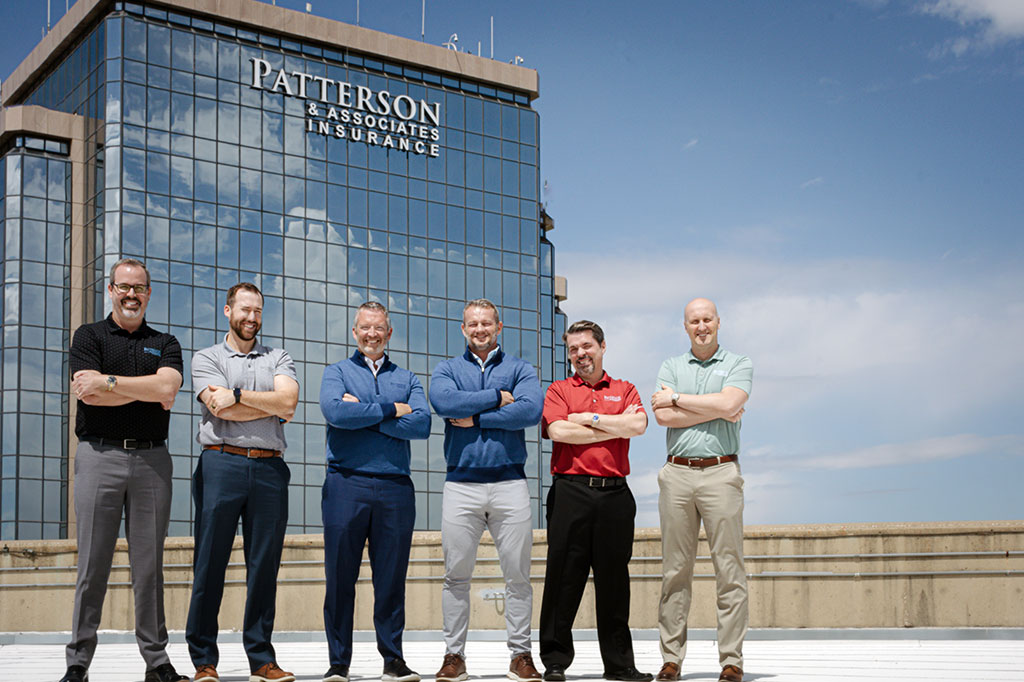 Patterson & Associates Insurance partners on roof